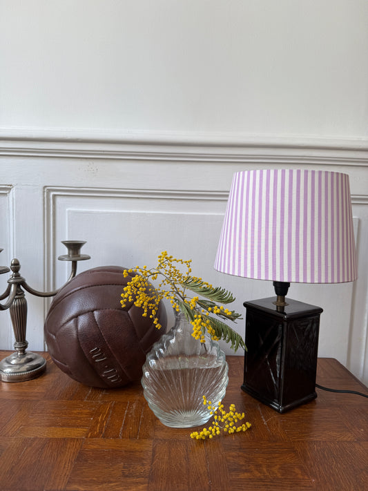 Black ceramic table lamp with purple and white striped design by Razzia, featuring a sleek, modern shape and decorative pattern.