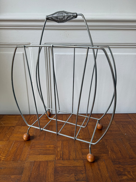 Porte-revues vintage Razzia des années 60/70 en métal avec design rétro, idéal pour rangement élégant.