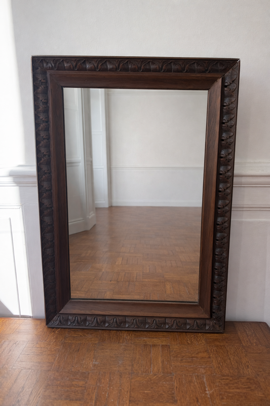 Decorative antique wooden carved mirror featuring intricate details and timeless charm, by Razzia.