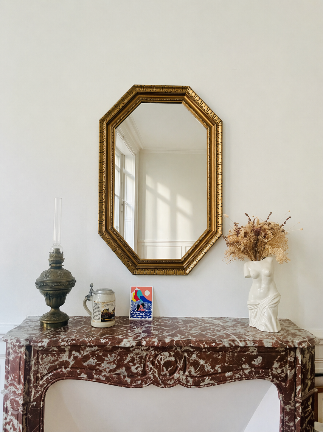 Miroir octogonal doré aux reflets cuivré