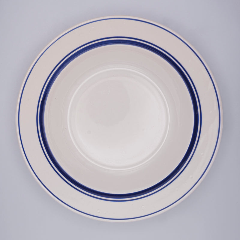 Six large deep blue-rimmed dinner plates from Razzia Days, showcasing elegant ceramic design and classic round shape.