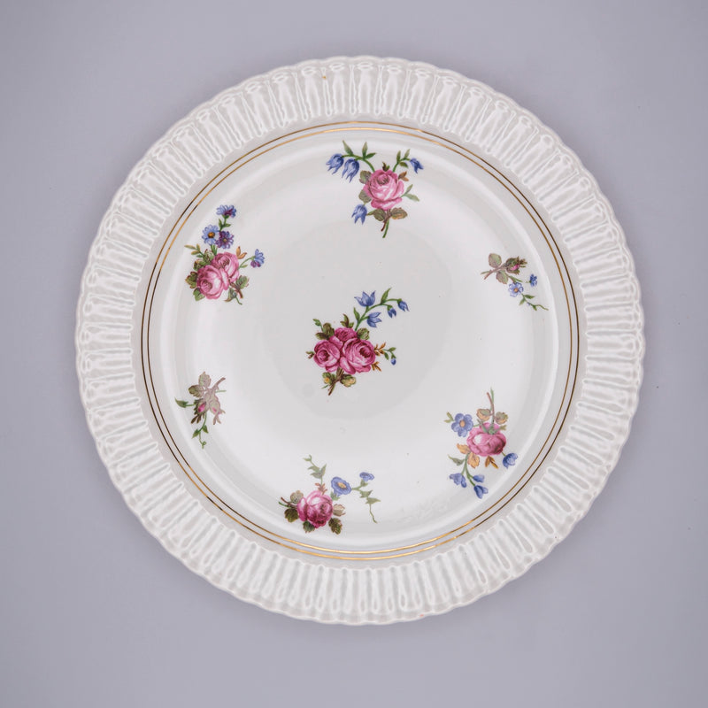Set of six floral porcelain plates by Razzia Days with vibrant flower patterns, perfect for elegant table settings.