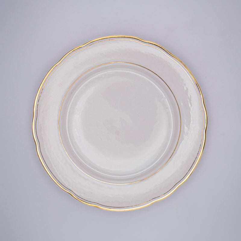 Set of petite porcelain plates with bohemian gold accents from Razzia Days, featuring intricate designs and elegant gold detailing.