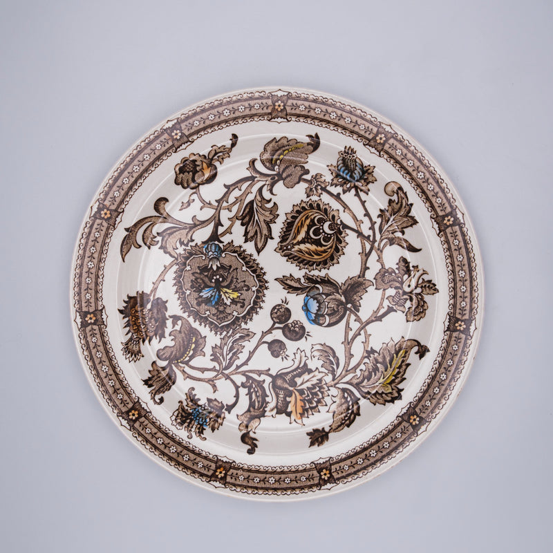 Set of Jacobean-style deep plates by Razzia Days featuring intricate floral patterns on white ceramic.