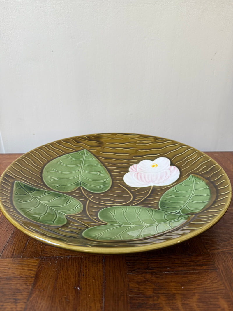 Ceramic Nymphaea lily pad plate by Razzia Days, showcasing intricate floral design and elegant craftsmanship from Sarreguemines.