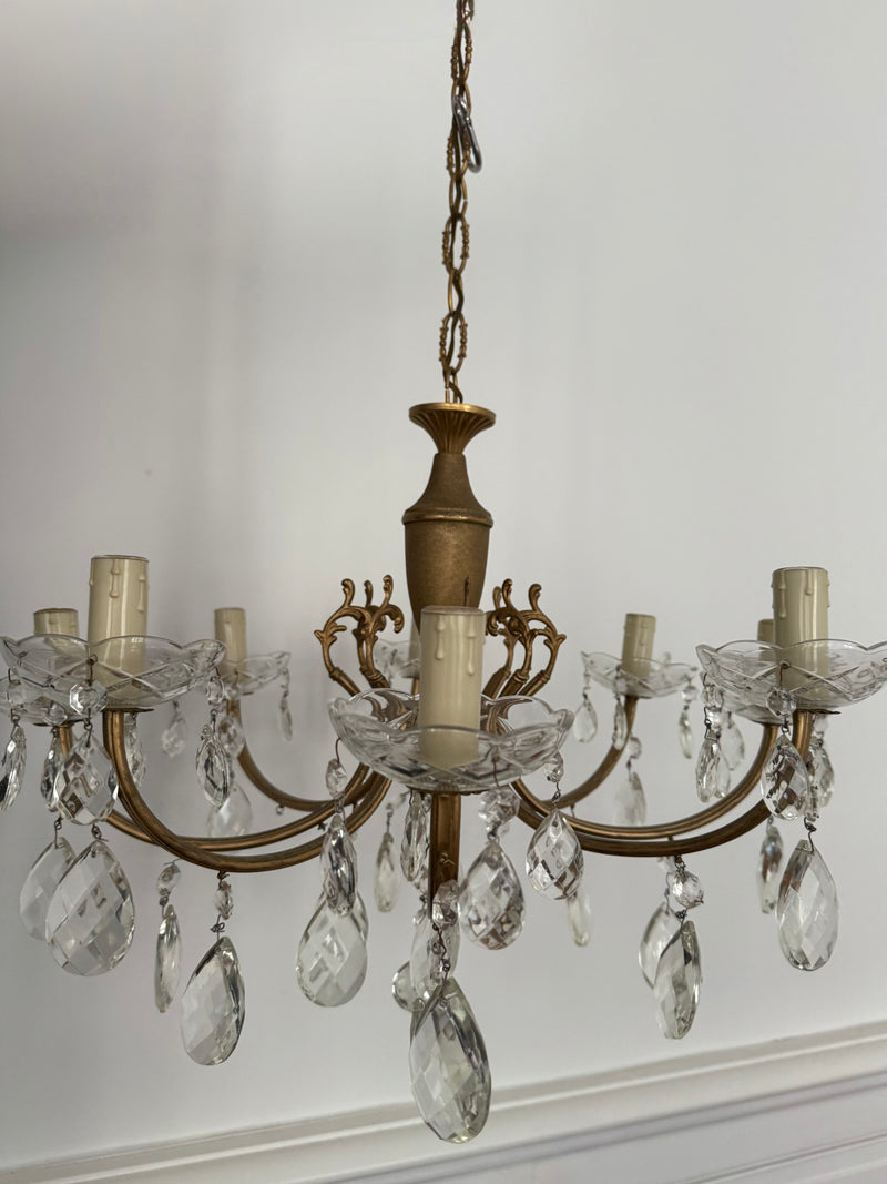Brass pendant chandelier with hanging crystal droplets, elegant lighting fixture by Razzia featuring a polished gold finish.