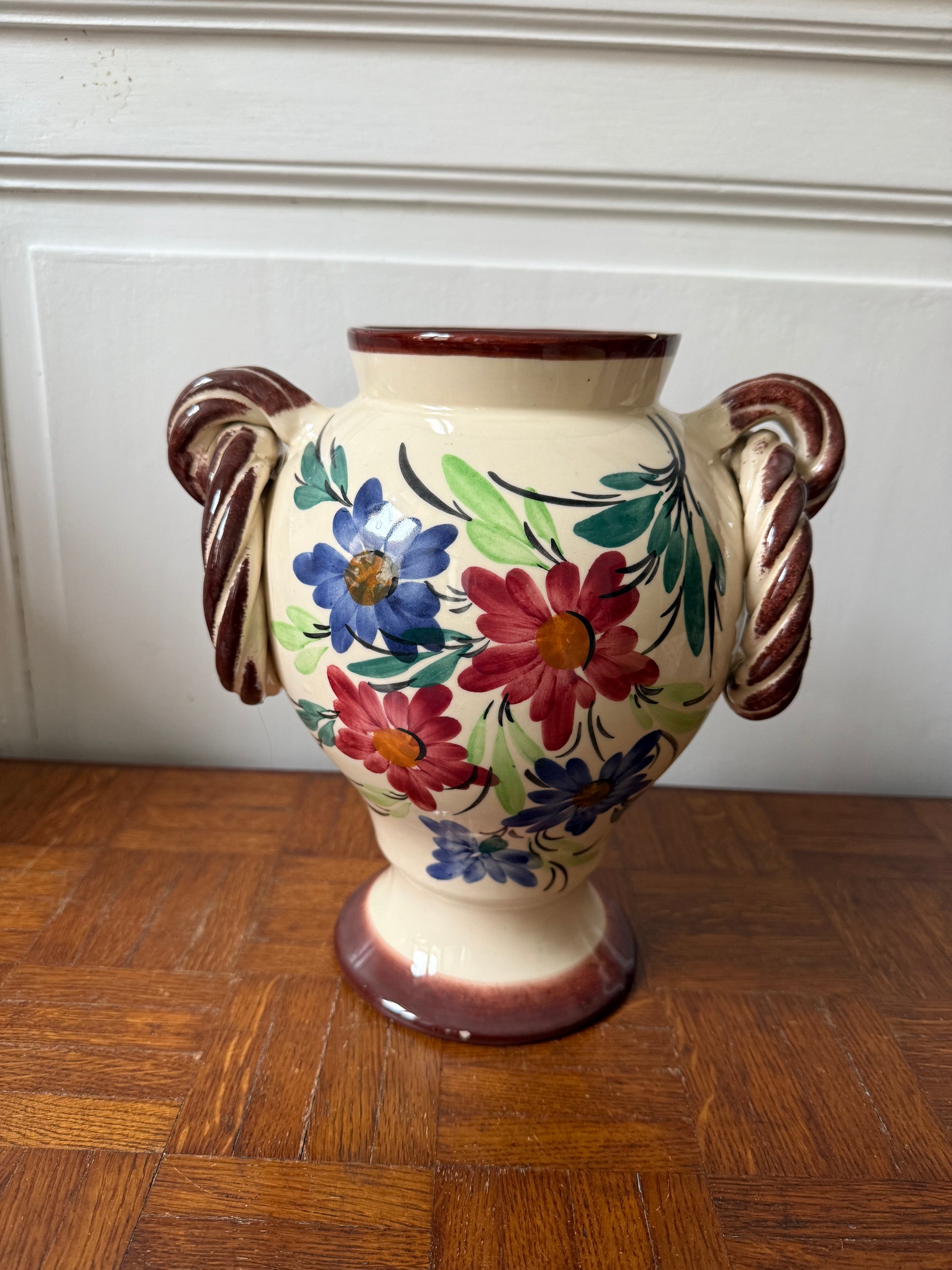 Hand-painted ceramic vase by Razzia Days featuring intricate designs and a classic shape, perfect for decorative display.
