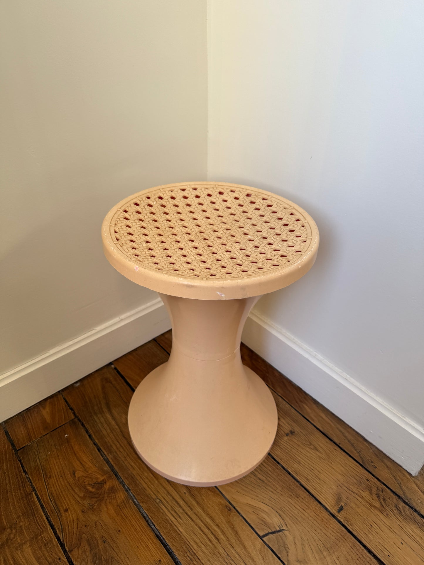 Razzia Tam-Tam Stamp tabouret with wooden legs and padded seat, made in France, featuring a stylish, modern design.