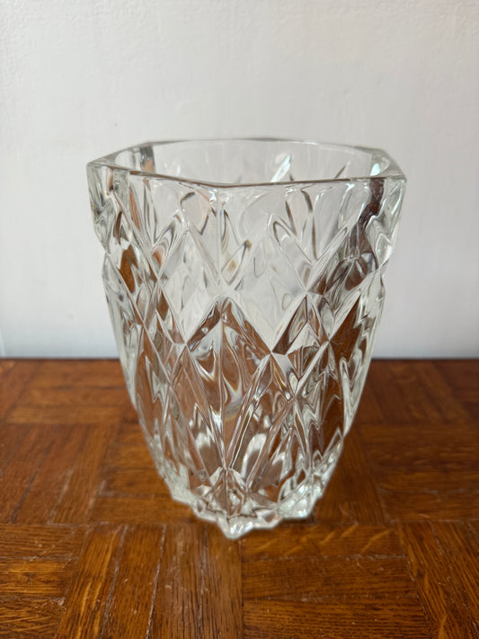 Clear glass vase by Razzia, showcasing a sleek, transparent design perfect for floral arrangements.