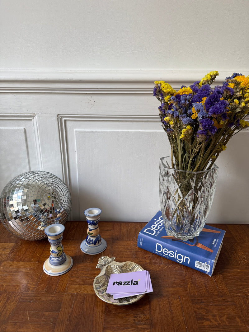 Pair of Razzia ceramic candle holders with a modern, minimalist design for decorative and ambient lighting.