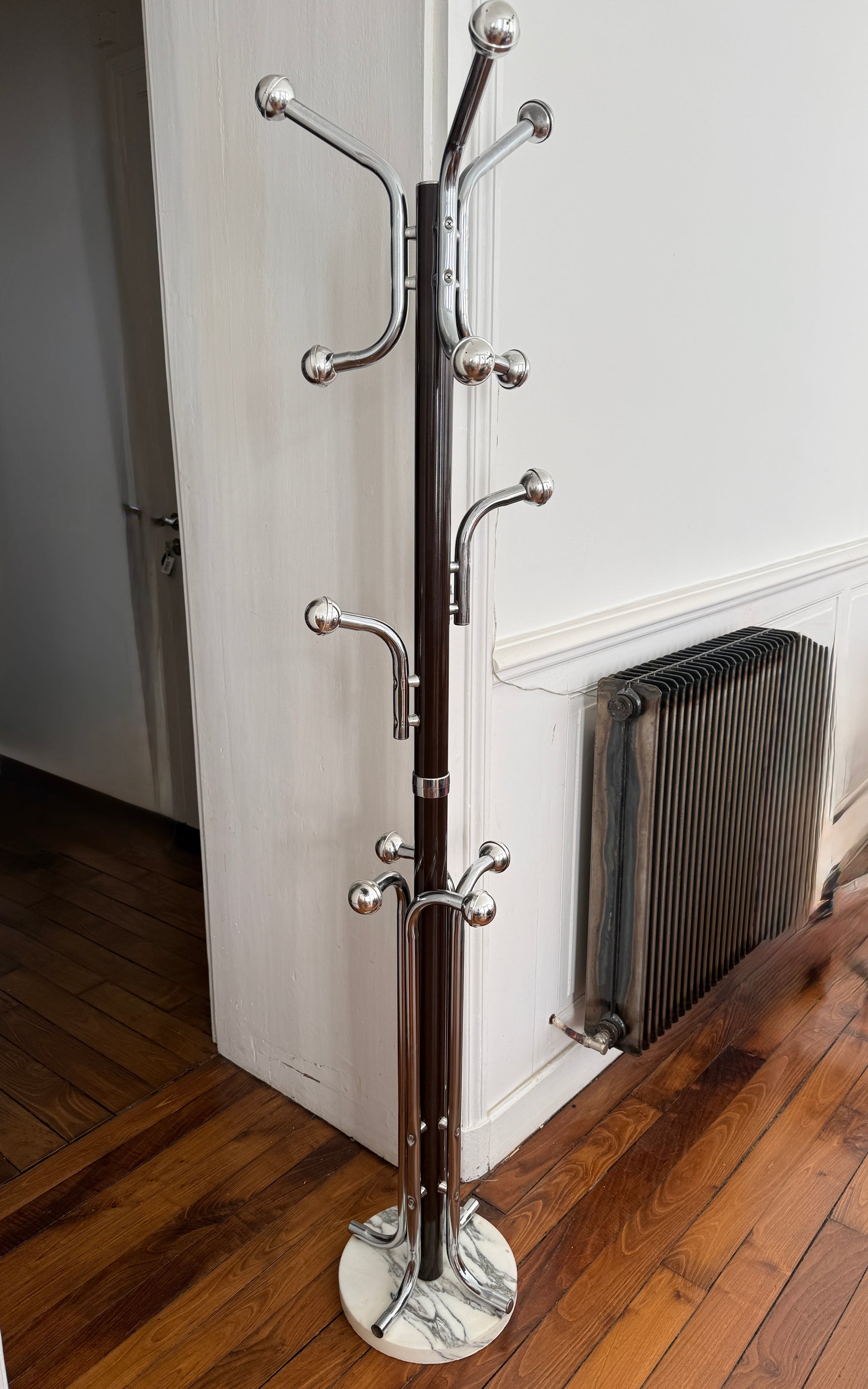 Vintage Razzia metal coat rack with 12 hooks, 1970s style, featuring a sturdy industrial design and retro aesthetic.