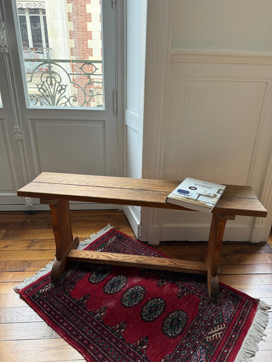 Natural wooden school bench by Razzia with a rustic finish, showcasing a classic educational furniture piece.