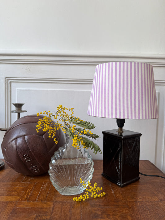 Black ceramic table lamp with violet and white striped design from Razzia, featuring a sleek, modern aesthetic.