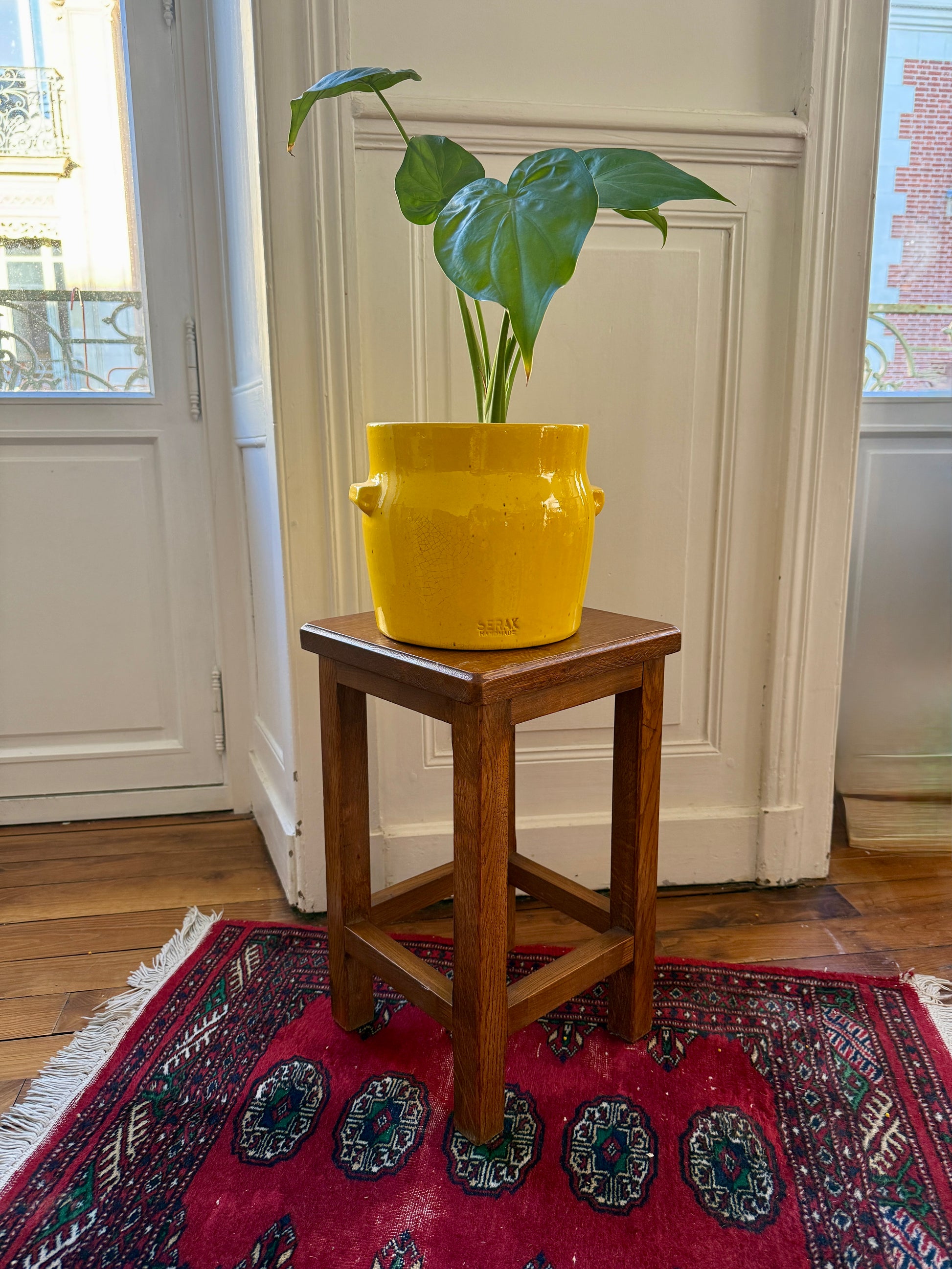 Wooden brutalist-style tabouret by Razzia with a minimalist, sturdy design and natural wood finish.