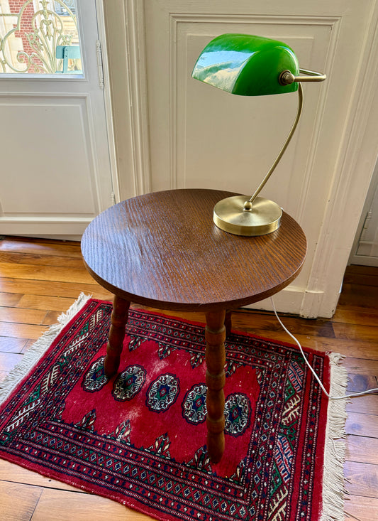 Wooden tripod side table with brutalist design by Razzia, featuring a sturdy, minimalist wooden structure and geometric shape.