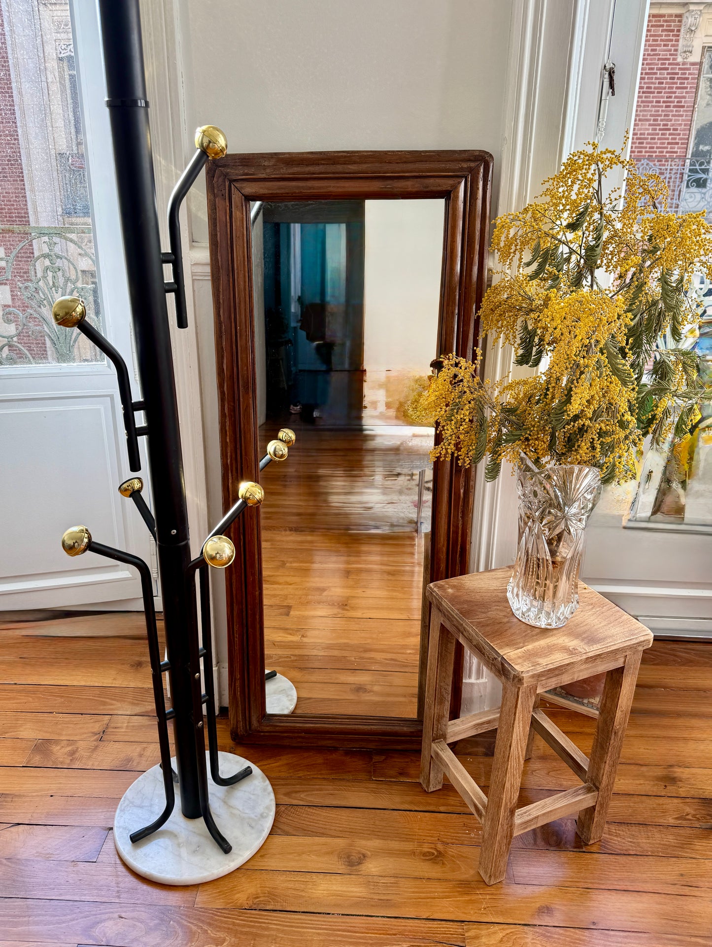 Brutalist wooden stool with aged, distressed finish by Razzia, showcasing its rustic, natural wood texture and sturdy design.