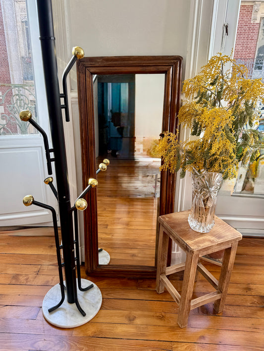 Brutalist wooden stool with aged, distressed finish by Razzia, showcasing its rustic, natural wood texture and sturdy design.