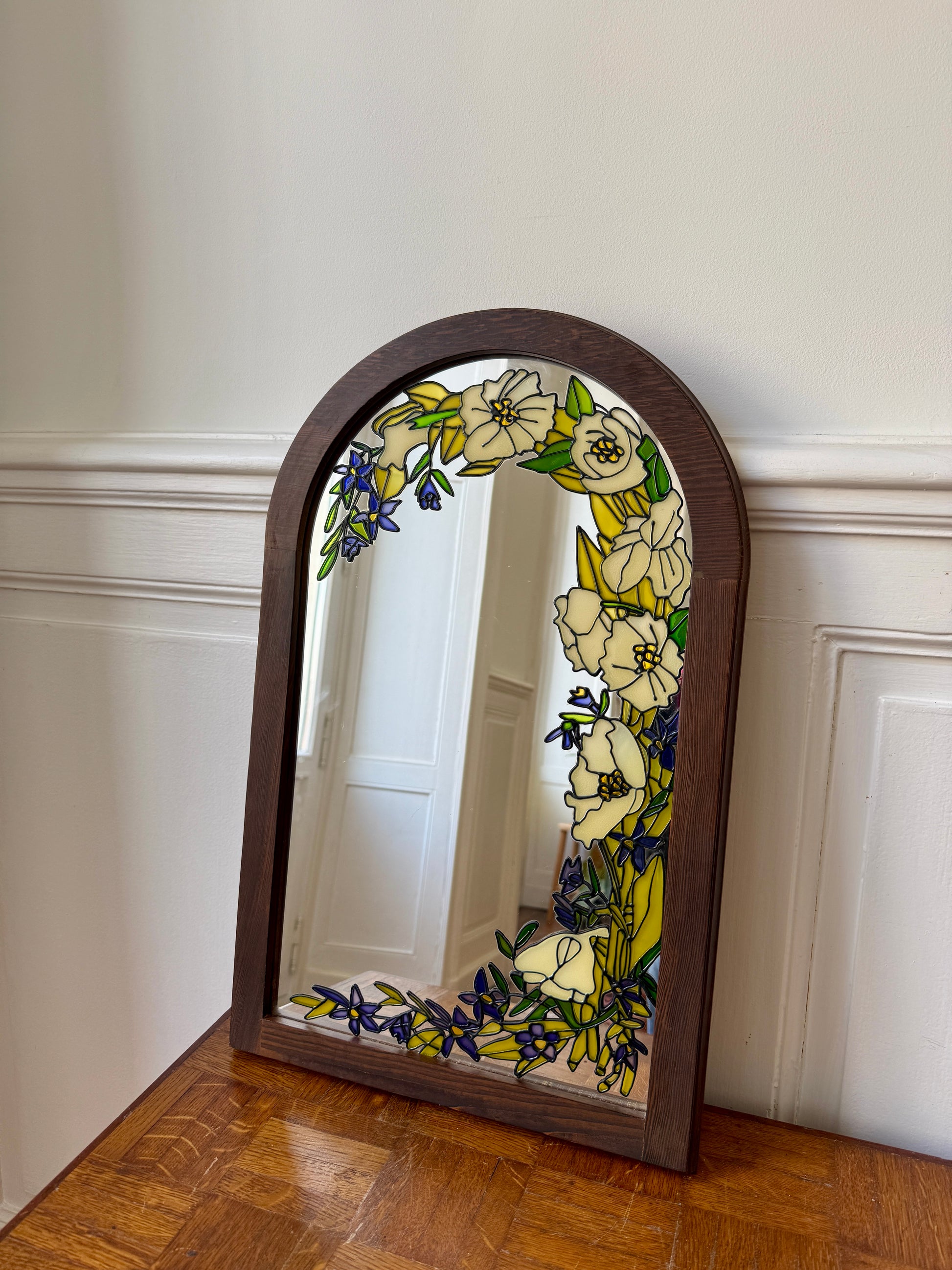 Miroir Tiffany Art Déco Razzia avec cadre ornemental en verre transparent, design élégant et sophistiqué.