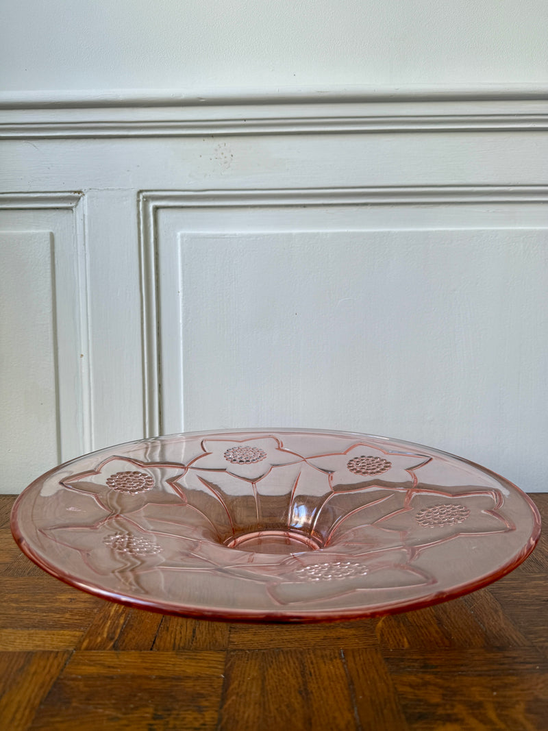 Plat en rosaline Razzia avec motifs floraux, design élégant et coloré, en céramique fine pour décoration ou service.