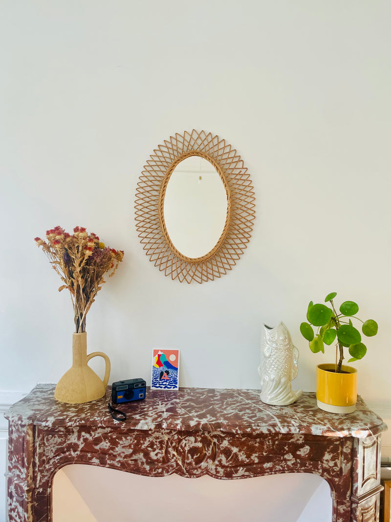 Oval osier mirror by Razzia Days featuring a woven wicker frame, ideal for bohemian or rustic interior decor.