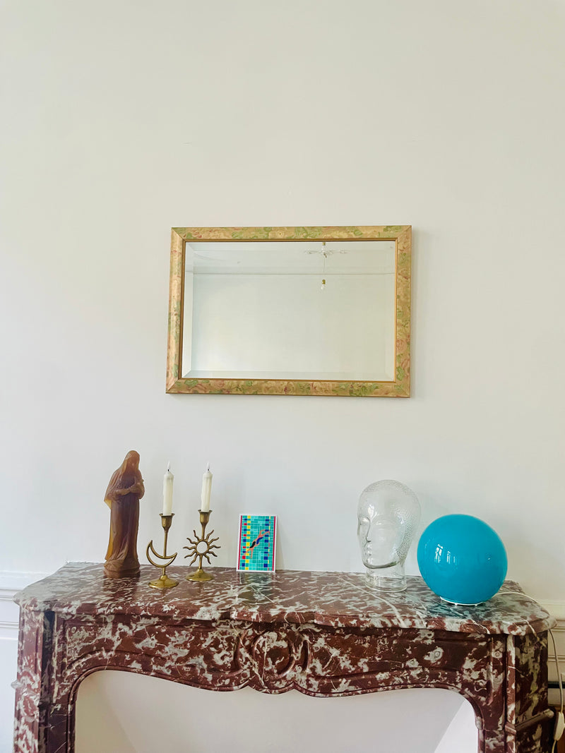 Round floral beveled mirror from Razzia Days featuring a decorative floral frame and a smooth, beveled edge for stylish reflection.